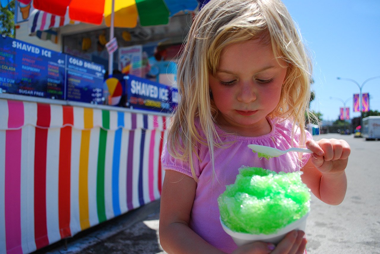 Girl Eating Snowcone